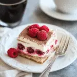 Indulge in a Decadent Twist with Fresh Raspberry Tiramisu Recipe 9 Slice of Fresh Raspberry Tiramisu on dessert plate
