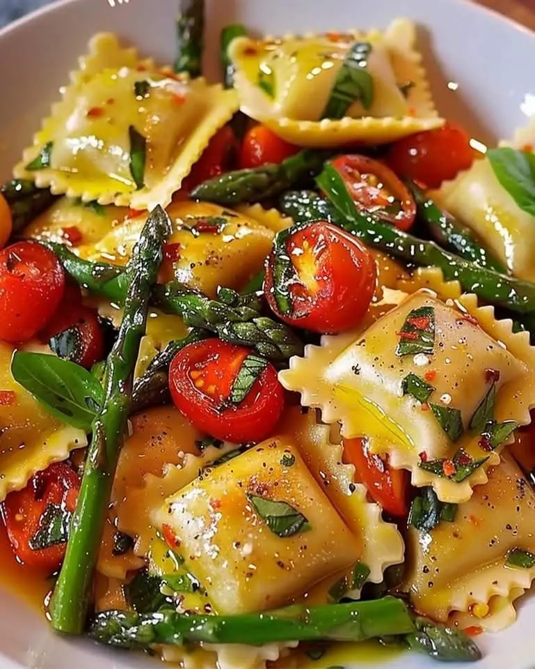 ravioli tomatoes asparagus garlic herbs